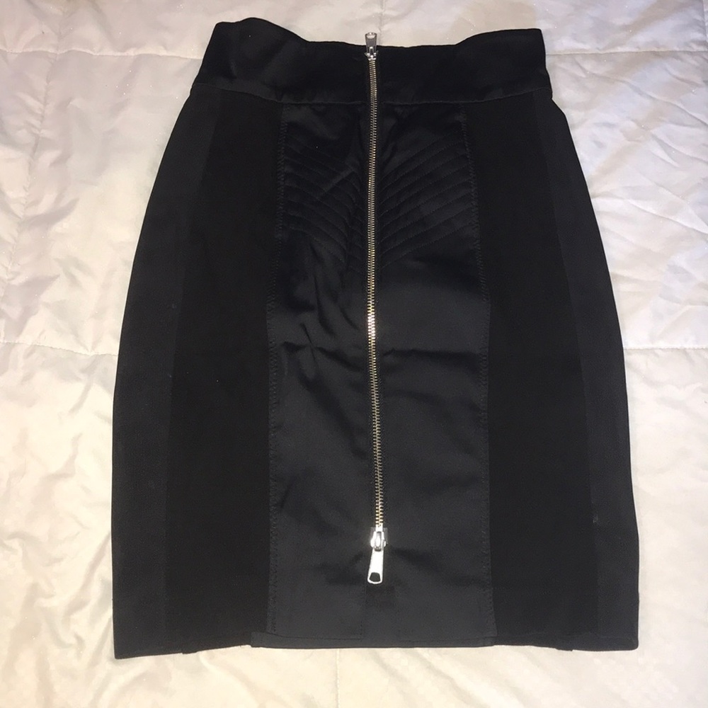 Knee length tight pencil skirt. Mesh on sides.
